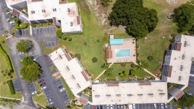 Fully remodeled 3BD/2BA first-floor corner unit in Dorchester at on Poinciana Golf Club in Florida - for sale on GolfHomes.com, golf home, golf lot