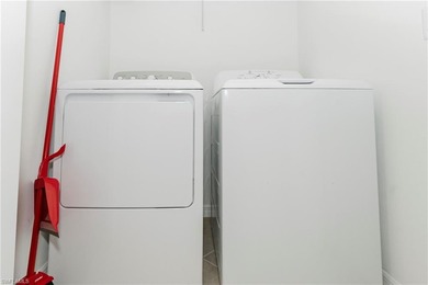 Welcome to TURNKEY furnished resort living in The National Golf on Panther Run Golf Club in Florida - for sale on GolfHomes.com, golf home, golf lot