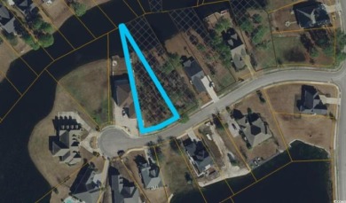 Stunning 0.39-Acre Homesite on a lake in Myrtle Beach's Premier on Wild Wing Plantation in South Carolina - for sale on GolfHomes.com, golf home, golf lot