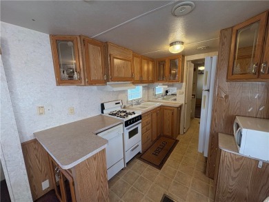 Looking for an active 55+ gated community in the heart of on Riverview Golf Course in Arizona - for sale on GolfHomes.com, golf home, golf lot