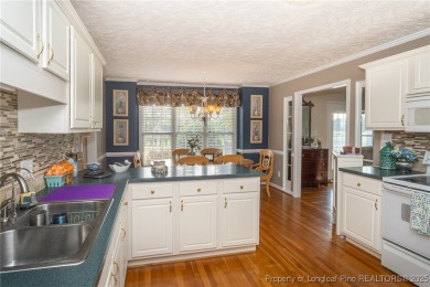 Beautiful brick home on a stunning golf course lot in the on Kings Grant Golf and Country Club in North Carolina - for sale on GolfHomes.com, golf home, golf lot