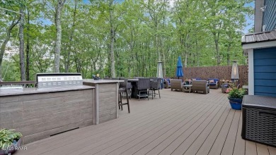 Immaculately maintained home in Tanglwood Lakes with an included on Paupack Hills Golf and Country Club in Pennsylvania - for sale on GolfHomes.com, golf home, golf lot