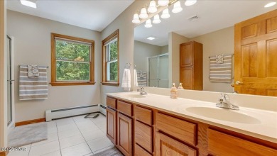 Immaculately maintained home in Tanglwood Lakes with an included on Paupack Hills Golf and Country Club in Pennsylvania - for sale on GolfHomes.com, golf home, golf lot