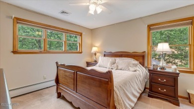 Immaculately maintained home in Tanglwood Lakes with an included on Paupack Hills Golf and Country Club in Pennsylvania - for sale on GolfHomes.com, golf home, golf lot