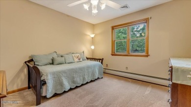 Immaculately maintained home in Tanglwood Lakes with an included on Paupack Hills Golf and Country Club in Pennsylvania - for sale on GolfHomes.com, golf home, golf lot