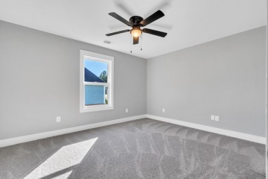 Nestled on the corner lot is an absolute gorgeous new on Canongate At Healy Point Country Club in Georgia - for sale on GolfHomes.com, golf home, golf lot