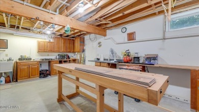 Immaculately maintained home in Tanglwood Lakes with an included on Paupack Hills Golf and Country Club in Pennsylvania - for sale on GolfHomes.com, golf home, golf lot