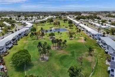 Carefree Living at Leisureville, Centrally Located In Pompano on Leisureville Community Association in Florida - for sale on GolfHomes.com, golf home, golf lot