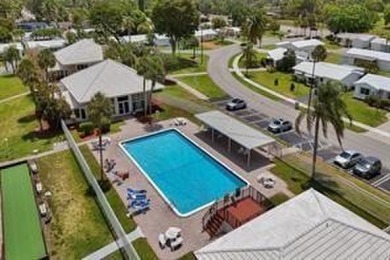 Carefree Living at Leisureville, Centrally Located In Pompano on Leisureville Community Association in Florida - for sale on GolfHomes.com, golf home, golf lot