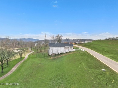 Build your dream home in this quickly developing area of on Tennessee National Golf Club in Tennessee - for sale on GolfHomes.com, golf home, golf lot