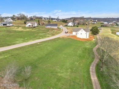 Build your dream home in this quickly developing area of on Tennessee National Golf Club in Tennessee - for sale on GolfHomes.com, golf home, golf lot