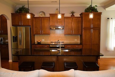 Discover this beautifully maintained home at 1014 Meadowlands on Meadowlands Golf Club in North Carolina - for sale on GolfHomes.com, golf home, golf lot