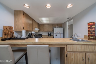 Tucked inside one of the area's most sought-after golf on Sugar Mill Country Club in Florida - for sale on GolfHomes.com, golf home, golf lot