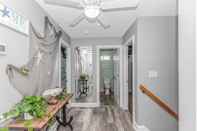 This very open and spacious 5 Bedroom, 4.5 Bath raised beach on Prestwick Country Club in South Carolina - for sale on GolfHomes.com, golf home, golf lot