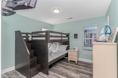 This very open and spacious 5 Bedroom, 4.5 Bath raised beach on Prestwick Country Club in South Carolina - for sale on GolfHomes.com, golf home, golf lot