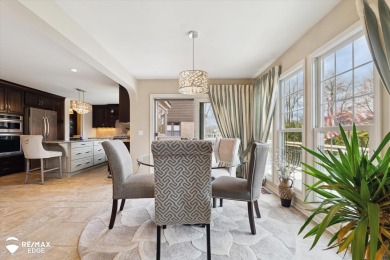 Discover luxurious lakefront living in this beautifully on Indianwood Golf and Country Club in Michigan - for sale on GolfHomes.com, golf home, golf lot