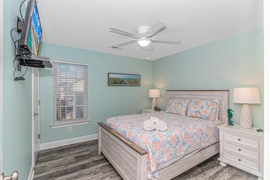 This very open and spacious 5 Bedroom, 4.5 Bath raised beach on Prestwick Country Club in South Carolina - for sale on GolfHomes.com, golf home, golf lot