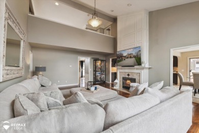 Discover luxurious lakefront living in this beautifully on Indianwood Golf and Country Club in Michigan - for sale on GolfHomes.com, golf home, golf lot