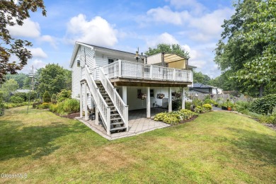 Expansive perennial gardens create a scenic park-like setting on Schuyler Meadows Club in New York - for sale on GolfHomes.com, golf home, golf lot