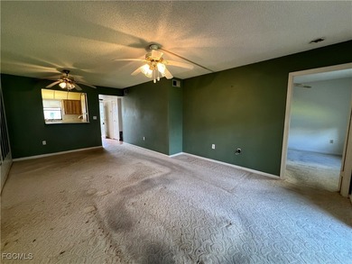 First-floor 2-bedroom, 2-bath condo located in the welcoming 55+ on Golden Gate Country Club in Florida - for sale on GolfHomes.com, golf home, golf lot