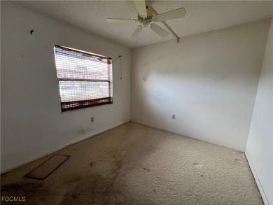 First-floor 2-bedroom, 2-bath condo located in the welcoming 55+ on Golden Gate Country Club in Florida - for sale on GolfHomes.com, golf home, golf lot