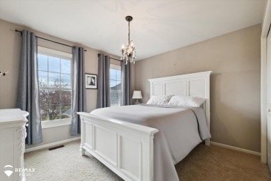 Discover luxurious lakefront living in this beautifully on Indianwood Golf and Country Club in Michigan - for sale on GolfHomes.com, golf home, golf lot