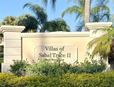 Welcome home to the HIGHLY desirable Villas of Sabal Trace. This on Sabal Trace Golf and Country Club in Florida - for sale on GolfHomes.com, golf home, golf lot