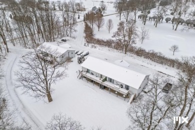 This 8-unit is located on beautiful Orchard Hills Golf Course on Orchard Hills Golf Course in Michigan - for sale on GolfHomes.com, golf home, golf lot