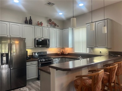 Highly sought-after PAVE Model located in the desirable Sun on Sun Lakes Country Club in California - for sale on GolfHomes.com, golf home, golf lot