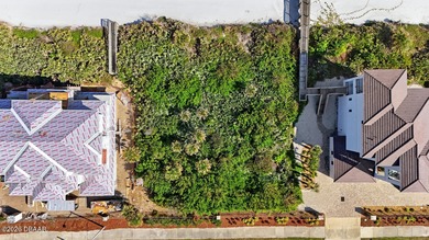 This estate-caliber homesite offers approximately 100 feet of on Hammock Dunes Club in Florida - for sale on GolfHomes.com, golf home, golf lot