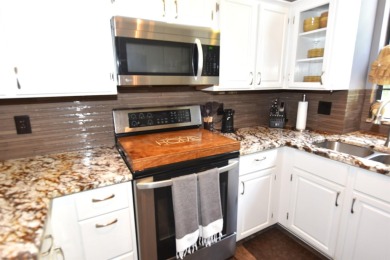 Welcome to this beautiful, 3-bedroom,1.5 bath home featuring on Indian Hills Country Club in Arkansas - for sale on GolfHomes.com, golf home, golf lot