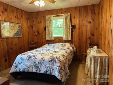 Nestled in the serene beauty of Lake Junaluska, this charming on Lake Junaluska Golf Course in North Carolina - for sale on GolfHomes.com, golf home, golf lot