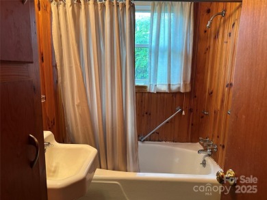 Nestled in the serene beauty of Lake Junaluska, this charming on Lake Junaluska Golf Course in North Carolina - for sale on GolfHomes.com, golf home, golf lot