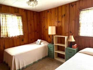 Nestled in the serene beauty of Lake Junaluska, this charming on Lake Junaluska Golf Course in North Carolina - for sale on GolfHomes.com, golf home, golf lot