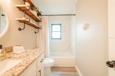 Welcome to your dream home in sunny Florida--where modern on Oyster Creek Golf Club in Florida - for sale on GolfHomes.com, golf home, golf lot