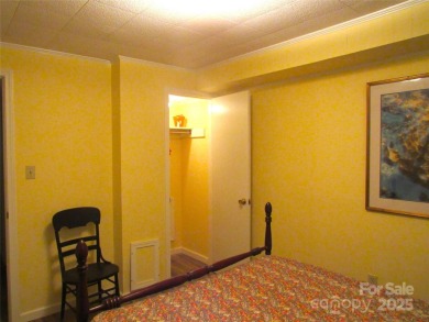 Nestled in the serene beauty of Lake Junaluska, this charming on Lake Junaluska Golf Course in North Carolina - for sale on GolfHomes.com, golf home, golf lot