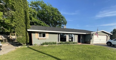 Recently remodeled with todays farmhouse style, come put some on The Oaks At Kincheloe in Michigan - for sale on GolfHomes.com, golf home, golf lot