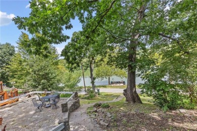 1st TIER ON THE LAKE! Nestled in a Gated Community--Enjoy Lake on Lake of the Forest Golf Course in Kansas - for sale on GolfHomes.com, golf home, golf lot