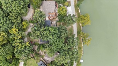 1st TIER ON THE LAKE! Nestled in a Gated Community--Enjoy Lake on Lake of the Forest Golf Course in Kansas - for sale on GolfHomes.com, golf home, golf lot