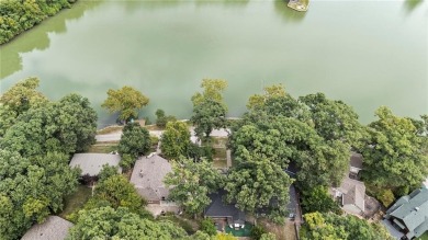 1st TIER ON THE LAKE! Nestled in a Gated Community--Enjoy Lake on Lake of the Forest Golf Course in Kansas - for sale on GolfHomes.com, golf home, golf lot