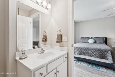 Welcome to your coastal retreat! This spacious 2-bedroom on Brunswick Plantation and Golf Resorts in North Carolina - for sale on GolfHomes.com, golf home, golf lot