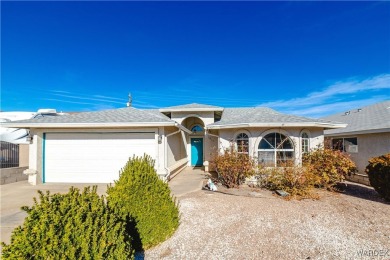 This charming 3-bedroom, 2-bathroom home offers a perfect blend on Cerbat Cliffs Golf Course in Arizona - for sale on GolfHomes.com, golf home, golf lot