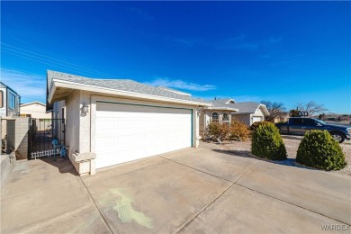 This charming 3-bedroom, 2-bathroom home offers a perfect blend on Cerbat Cliffs Golf Course in Arizona - for sale on GolfHomes.com, golf home, golf lot