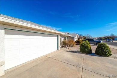 This charming 3-bedroom, 2-bathroom home offers a perfect blend on Cerbat Cliffs Golf Course in Arizona - for sale on GolfHomes.com, golf home, golf lot