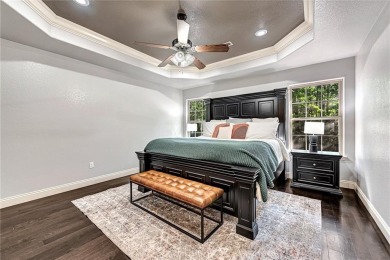 Tucked into the trees on a quiet Bella Vista street, this on Bella Vista - Metfield Golf Complex and Country Club in Arkansas - for sale on GolfHomes.com, golf home, golf lot