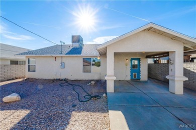 This charming 3-bedroom, 2-bathroom home offers a perfect blend on Cerbat Cliffs Golf Course in Arizona - for sale on GolfHomes.com, golf home, golf lot