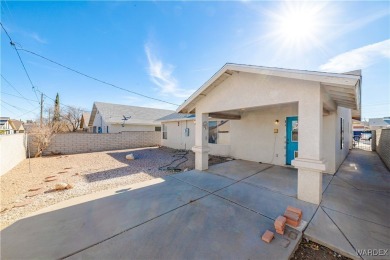 This charming 3-bedroom, 2-bathroom home offers a perfect blend on Cerbat Cliffs Golf Course in Arizona - for sale on GolfHomes.com, golf home, golf lot