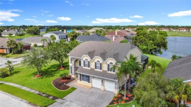 Stunning 5-Bedroom Pool Home on Expansive Corner Lot with Water on Oaks National Golf Course in Florida - for sale on GolfHomes.com, golf home, golf lot