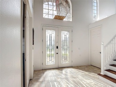Stunning 5-Bedroom Pool Home on Expansive Corner Lot with Water on Oaks National Golf Course in Florida - for sale on GolfHomes.com, golf home, golf lot