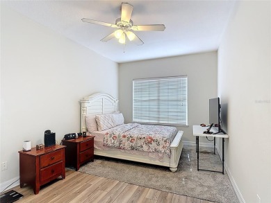 Stunning 5-Bedroom Pool Home on Expansive Corner Lot with Water on Oaks National Golf Course in Florida - for sale on GolfHomes.com, golf home, golf lot